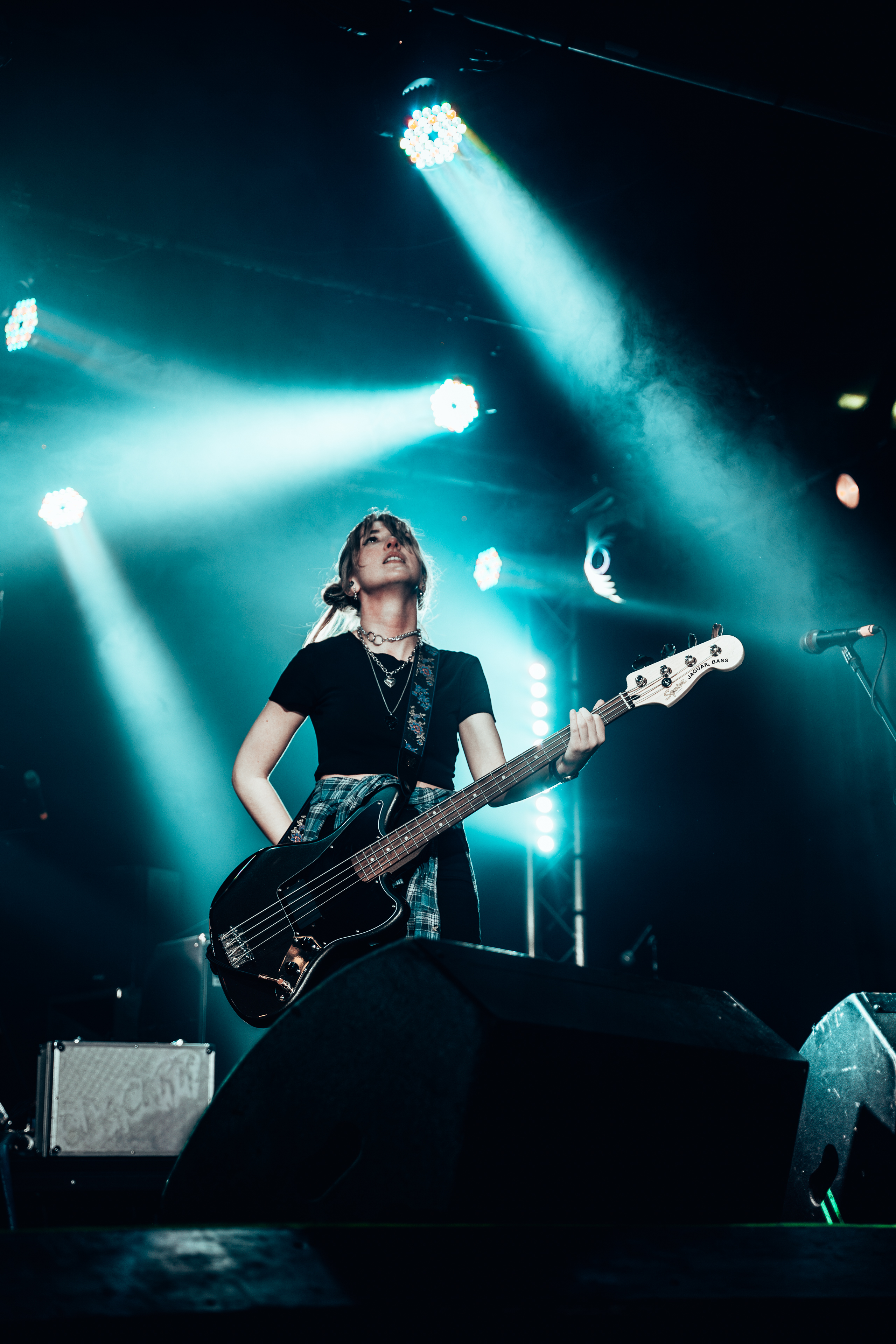 Slackrr's bassist, Cait, pictured on stage.